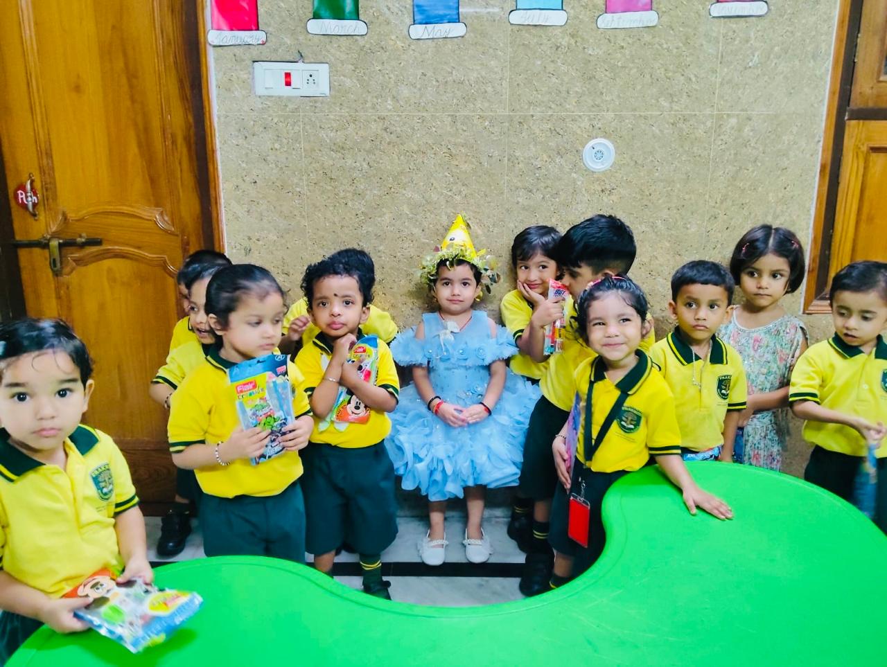 Students at a fancy dress celebration at Prakriti