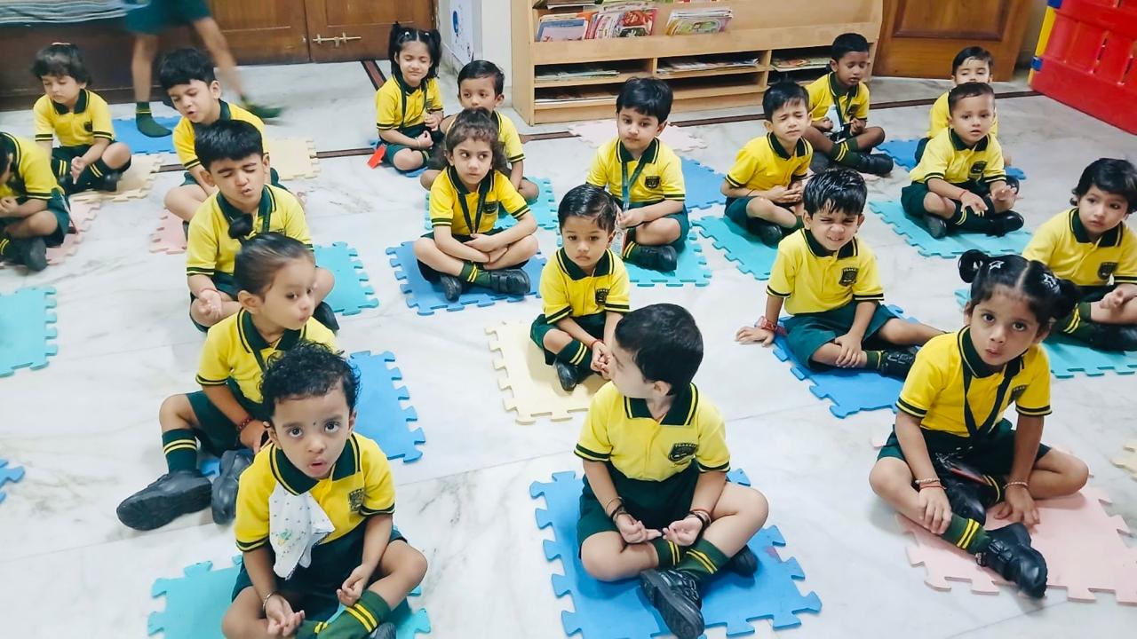 Students in a meditation circle at Prakriti