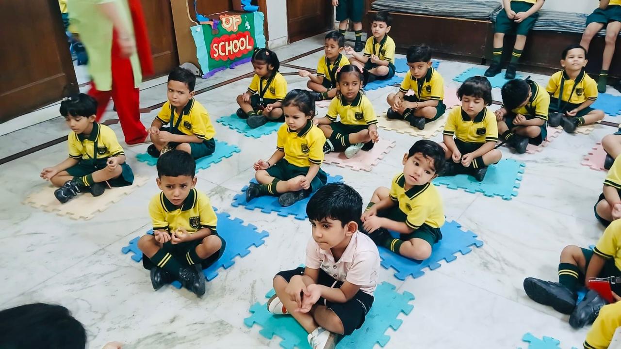 Students seated for morning assembly at Prakriti