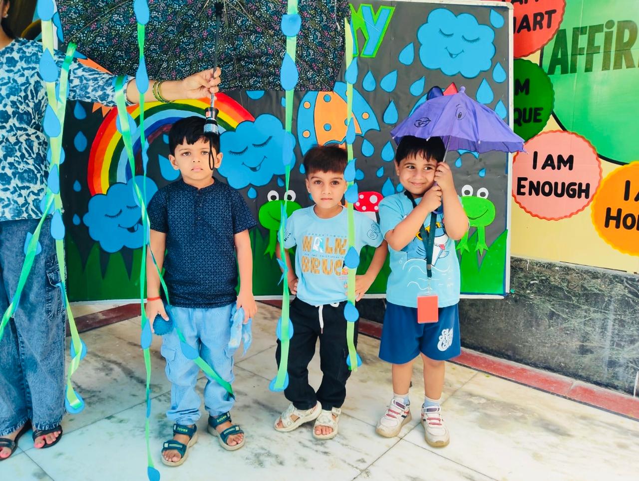 Students enjoying a rainy day themed activity at Prakriti
