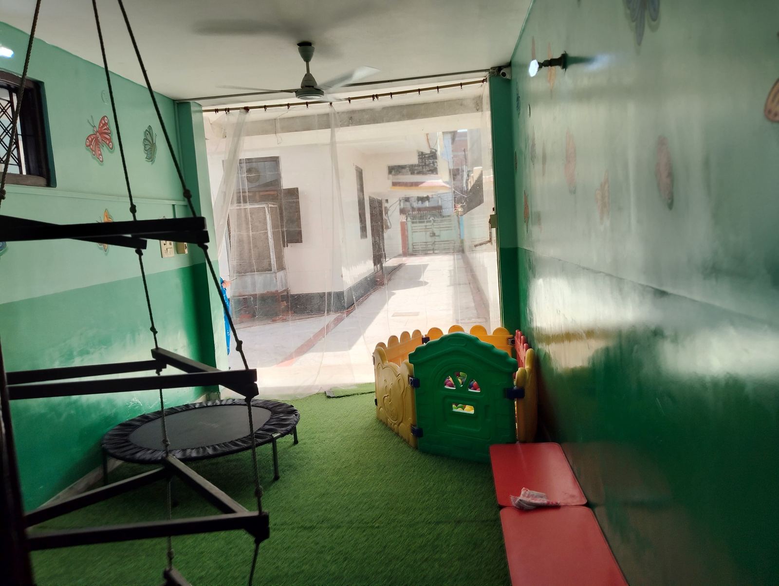 Prakriti turf play area with trampoline and swing